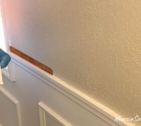 The totally unexpected way she makes over her blank, boring wall (cooler than shiplap!)