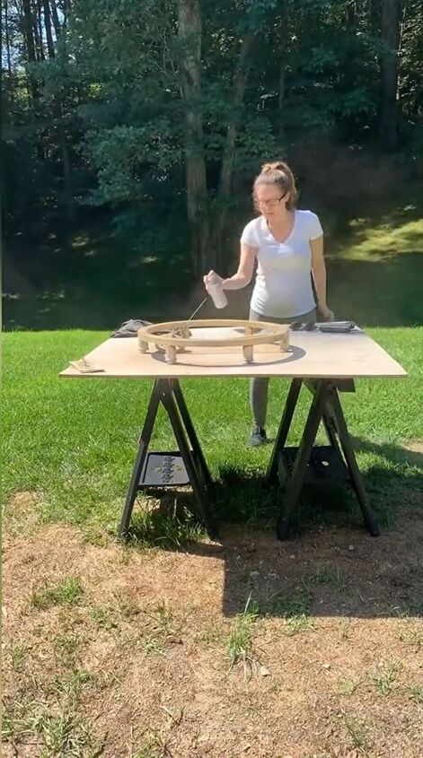 Spray-painting the chandelier