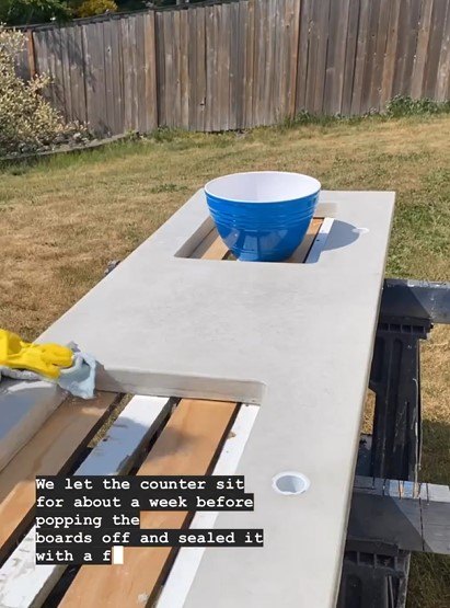 diy concrete bathroom countertops, Sanding and wiping the concrete