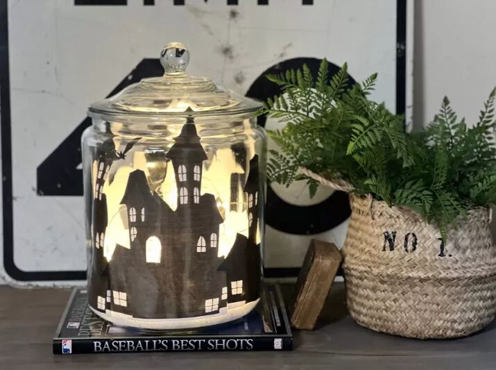 Haunted house silhouette in a jar