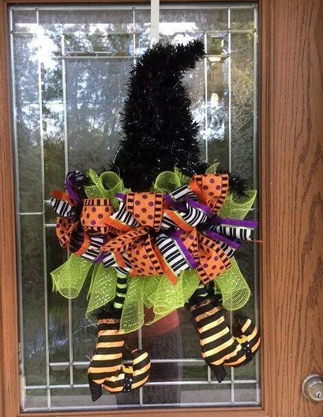 Witch hat wreath with dangling legs