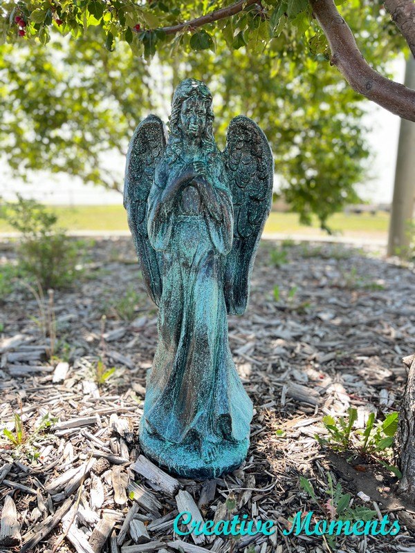 pintura de ptina para um anjo de jardim desgastado