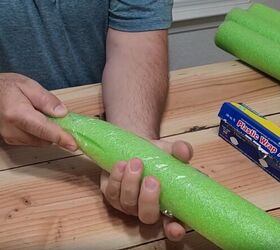 Cover the end of the cut pool noodle with Saran wrap