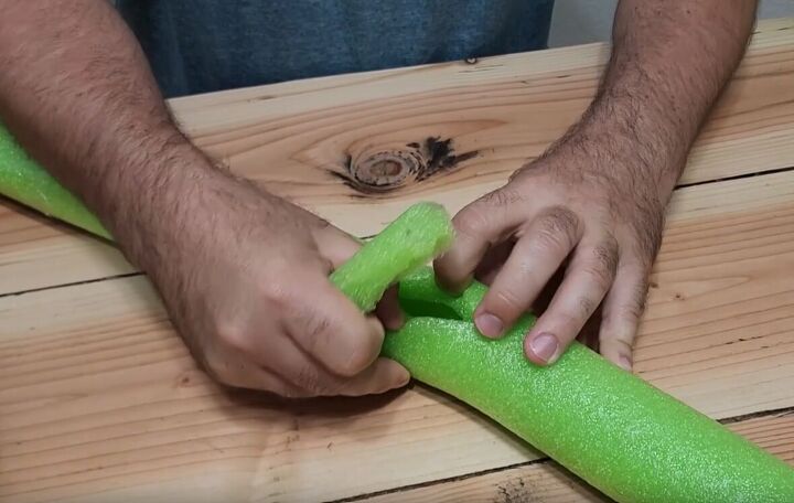 Cut a slit in the pool noodle