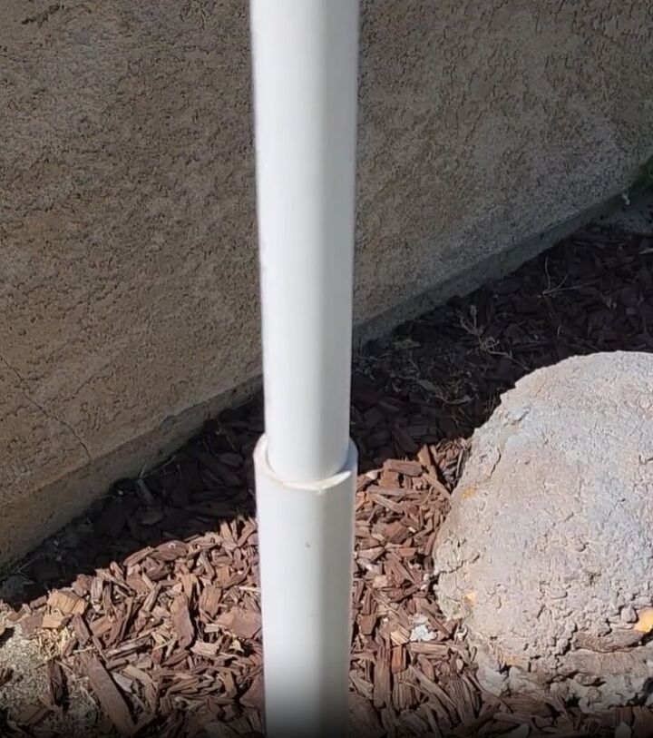 Slot the smaller PVC pipe into the larger one