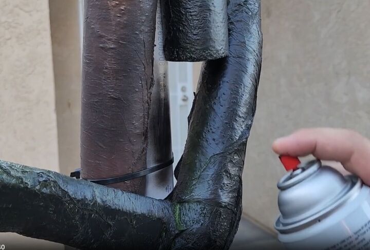 Paint any white pvc pipe peeking through the pool noodles in black