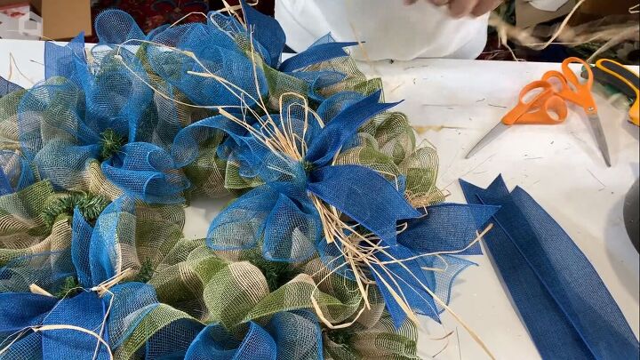 Wreath with raffia and ribbon