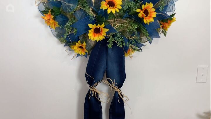 DIY scarecrow wreath with dangling legs