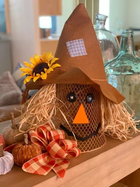 Waste paper basket scarecrow