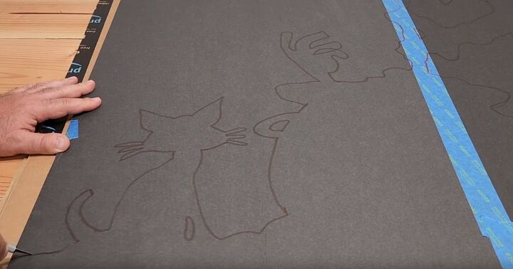 Carefully cut around the outline with a craft knife