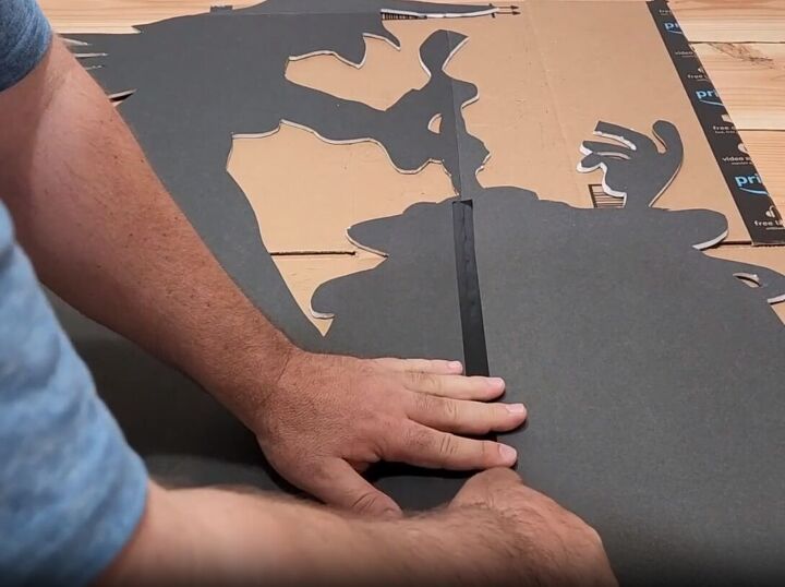 Using black foam board for Halloween window art