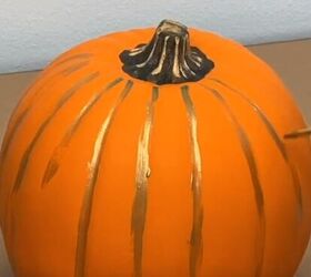 Apply gold paint to pumpkin
