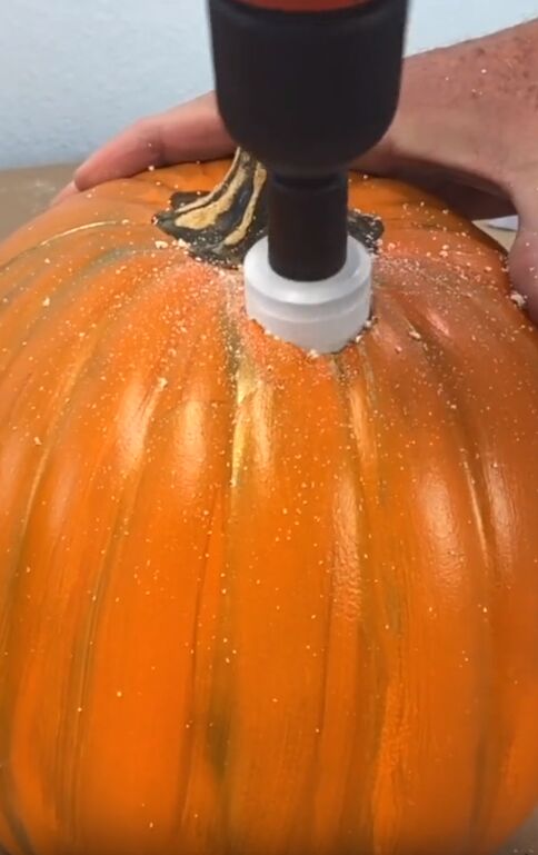 Drill the top of the pumpkins