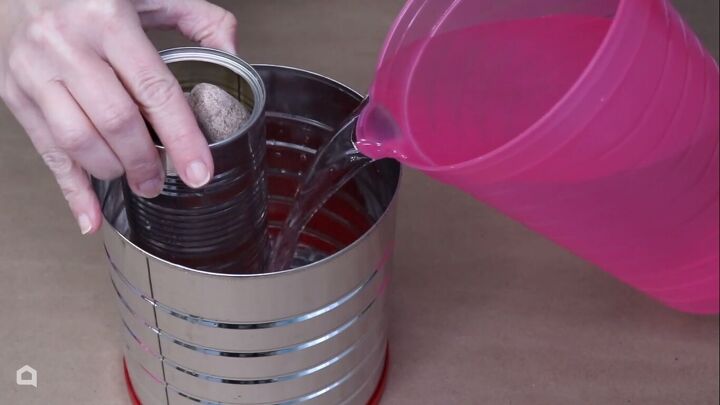 Pouring water into the coffee can