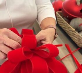 Making a big red bow with red velvet ribbon