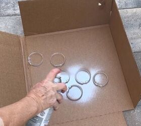 Spray-painting the shower curtain rings
