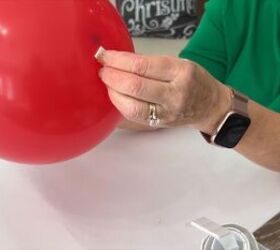 Applying foam mounting tape to the balloon