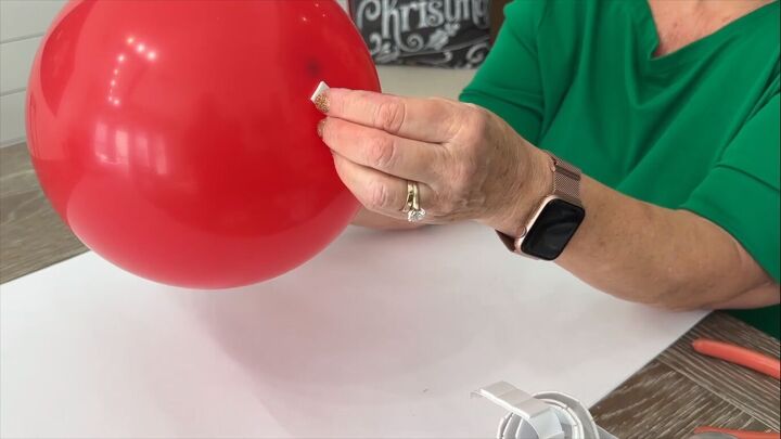 Applying foam mounting tape to the balloon