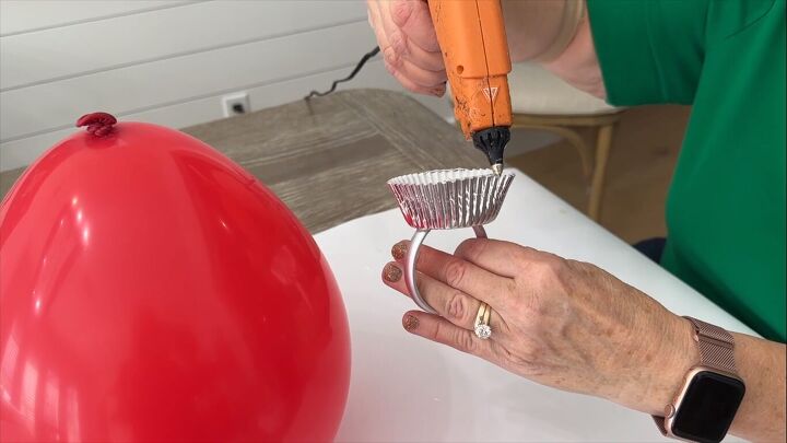 Gluing the cupcake liner