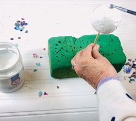 Painting a styrofoam ball with gel medium