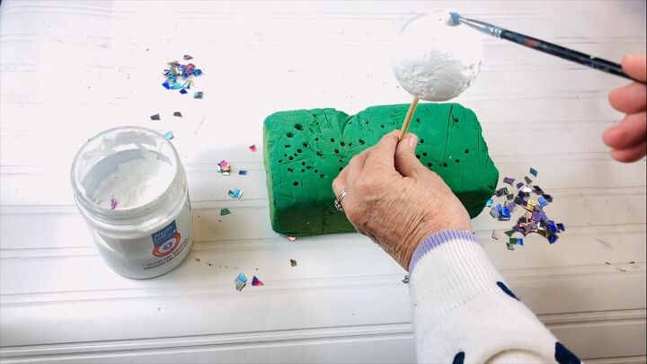 Painting a styrofoam ball with gel medium