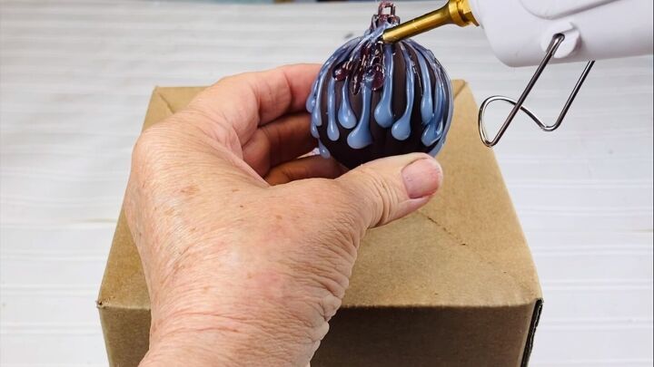 Using a hot glue gun to make glue drips