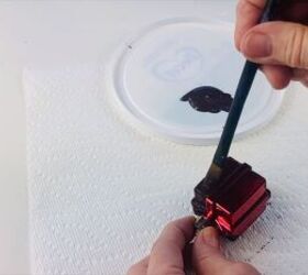 Painting the Christmas gift ornament black