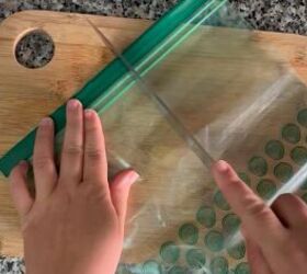 She slices her gallon-sized Ziploc bags down the middle for this brilliant, money-saving trick