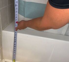 Measure the height of the tub