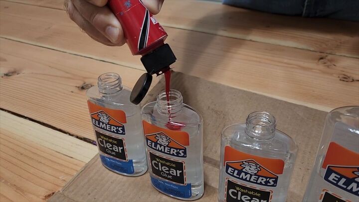Add a different colored paint to each Elmers clear glue container
