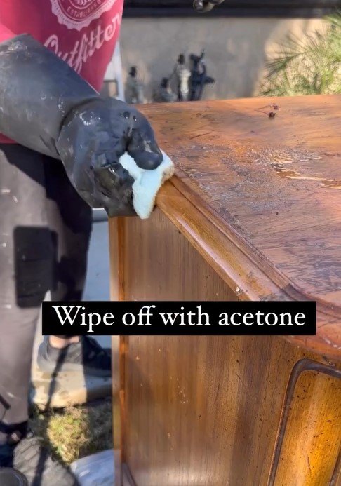 Wiping the furniture with acetone