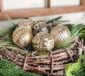Mercury glass ornaments in a nest