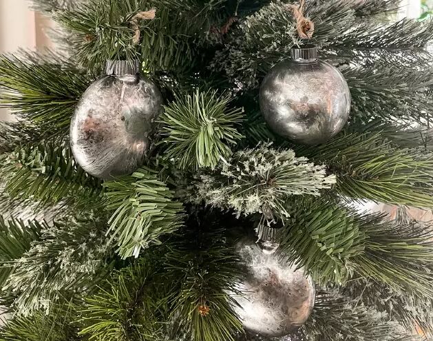 Mercury glass ornaments on a Christmas tree