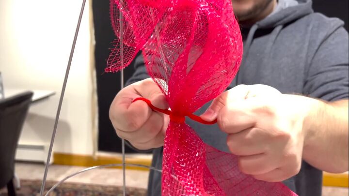 Tying the mesh with a pipe cleaner