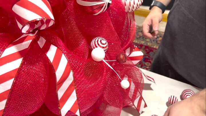 Adding the ornament sprays to the tree