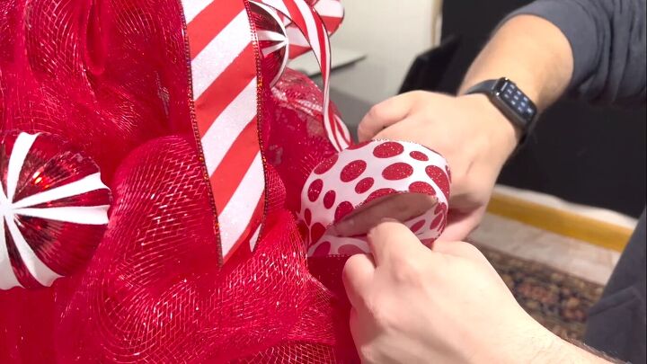 Tucking the ribbon loops into the tree