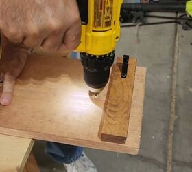 Predrill your holes for mounting the homemade shoe rack on the wall
