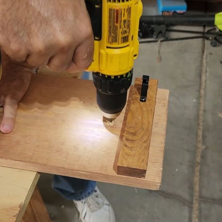 Predrill your holes for mounting the homemade shoe rack on the wall