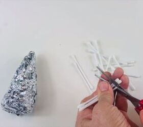 Cutting the tops off the Q-tips