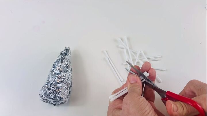 Cutting the tops off the Q-tips