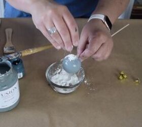 Sprinkle baking soda over the painted bauble