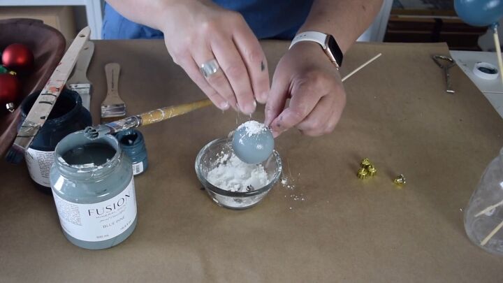 Sprinkle baking soda over the painted bauble