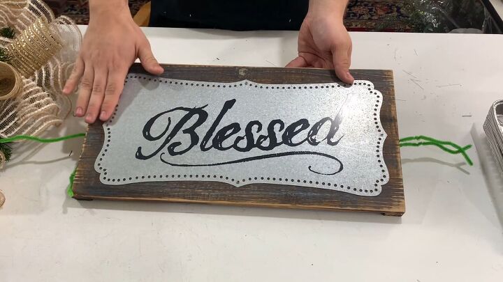 Wooden sign with the words Blessed