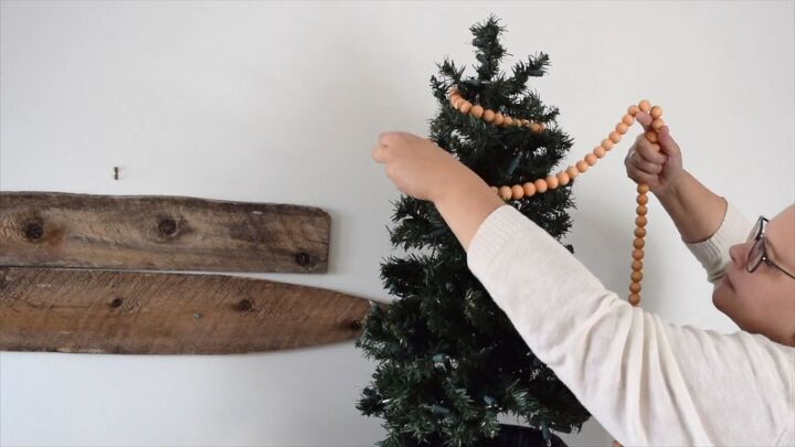 wood bead garland, Decorating a Christmas tree for fall season