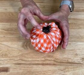 Reattach the stem to the wrapped pumpkin