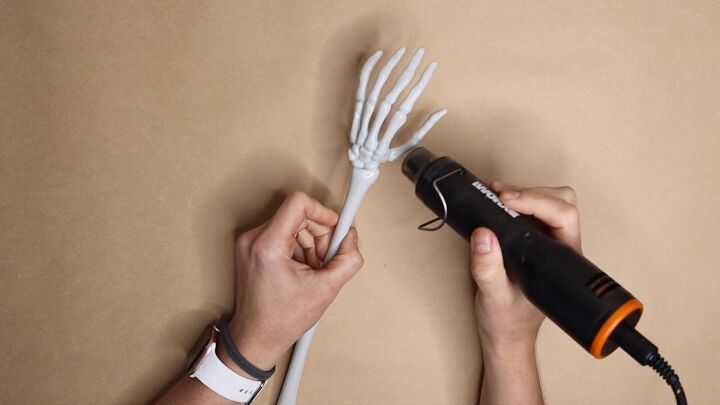 How to Craft Spooky Halloween Decor with Skeleton Arms