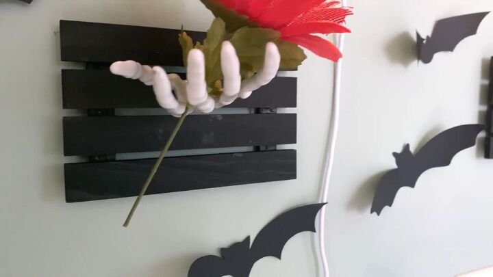 Display the eerie hands on your wall