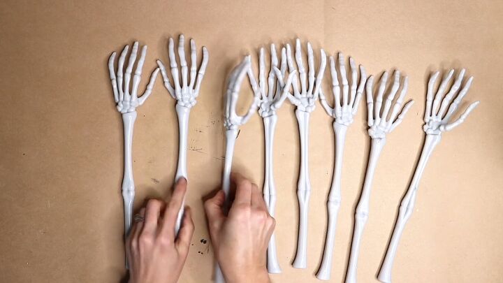 Skeleton arm garden border for Halloween