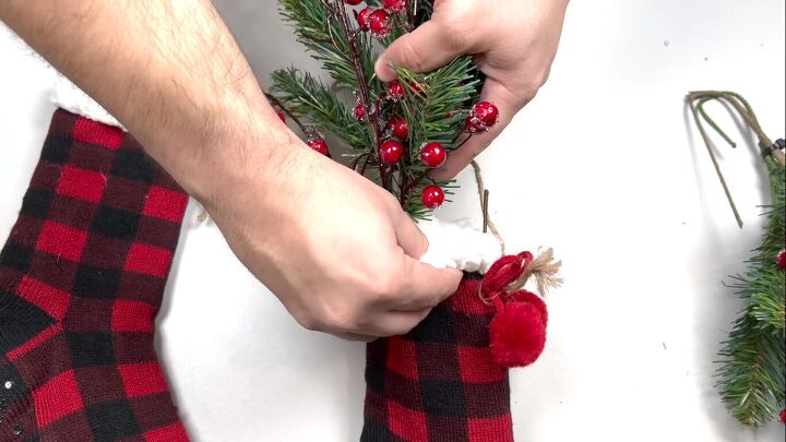 christmas stocking door hanger, Placing the stems inside the stockings