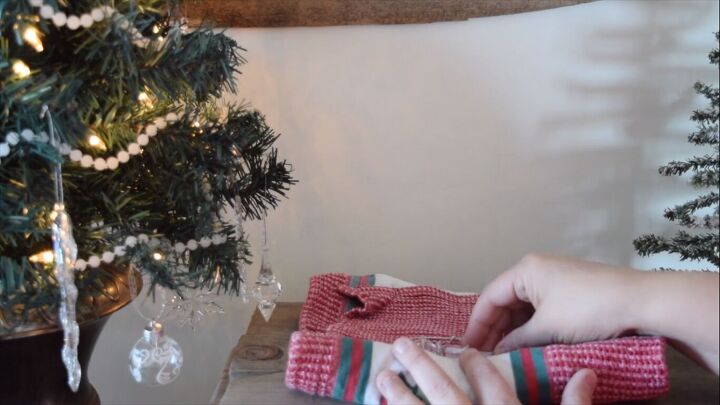 Rolling the breakable ornaments in Christmas towels